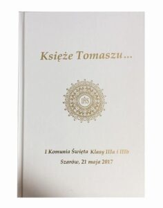 biała okładka komunijna